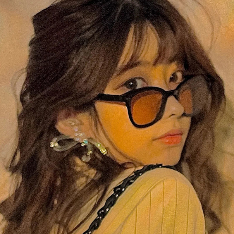Brown-Tinted Sunglasses — close-up detail