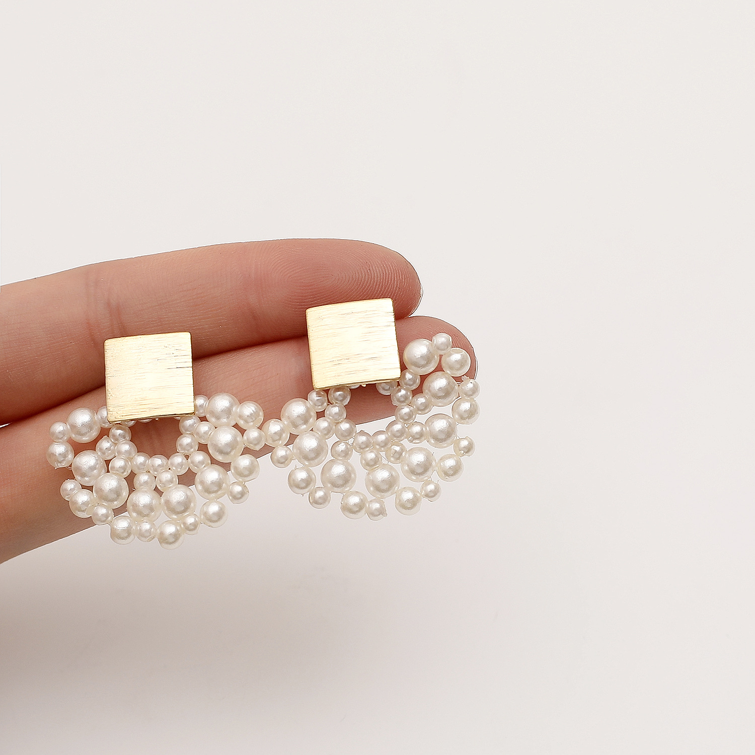 Woven Pearl Stud Earrings — product photo